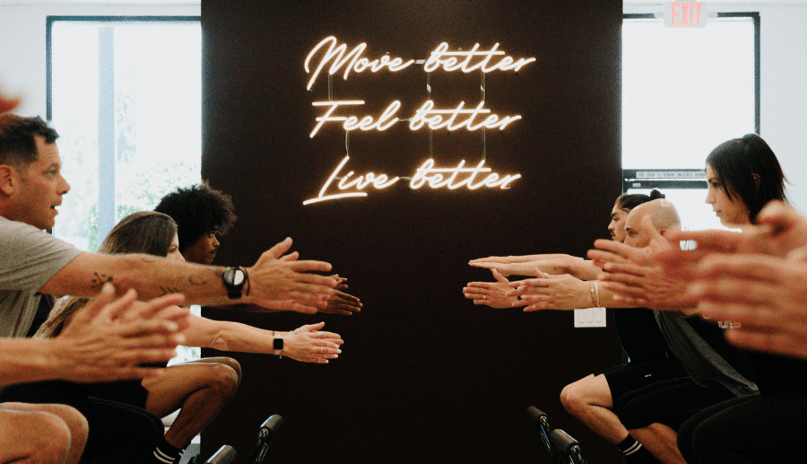 YA FIT Pilates instructor guiding client on reformer in Agoura Hills studio