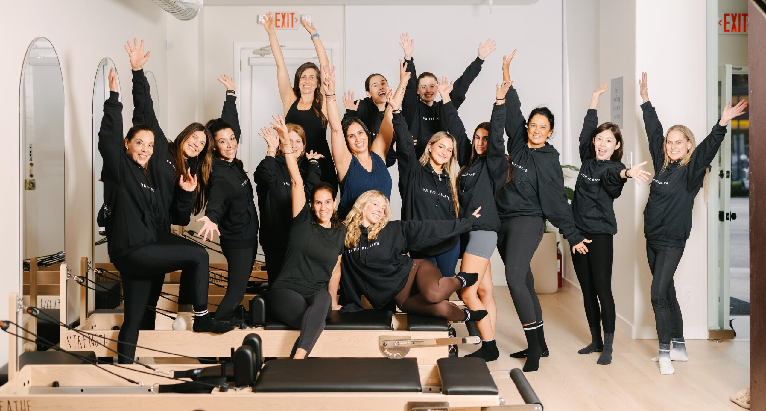 Small group reformer Pilates class at YA FIT Pilates Tarzana — 10 reformers per class