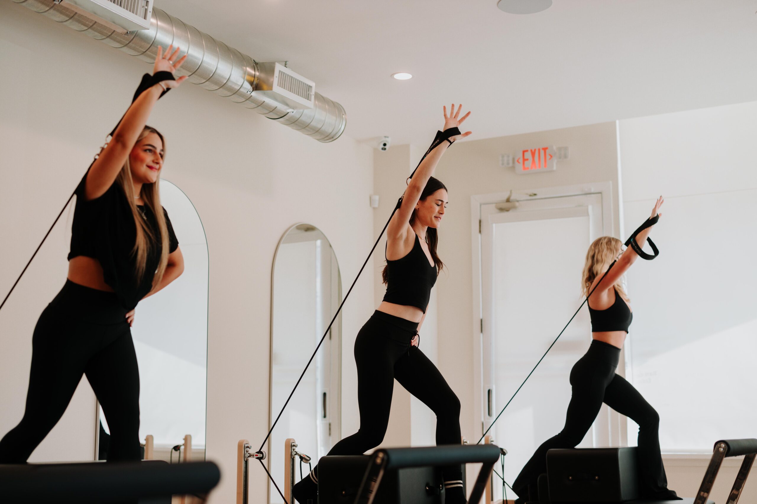 Reformer Pilates Woodland Hills members training at YA FIT Pilates Tarzana studio