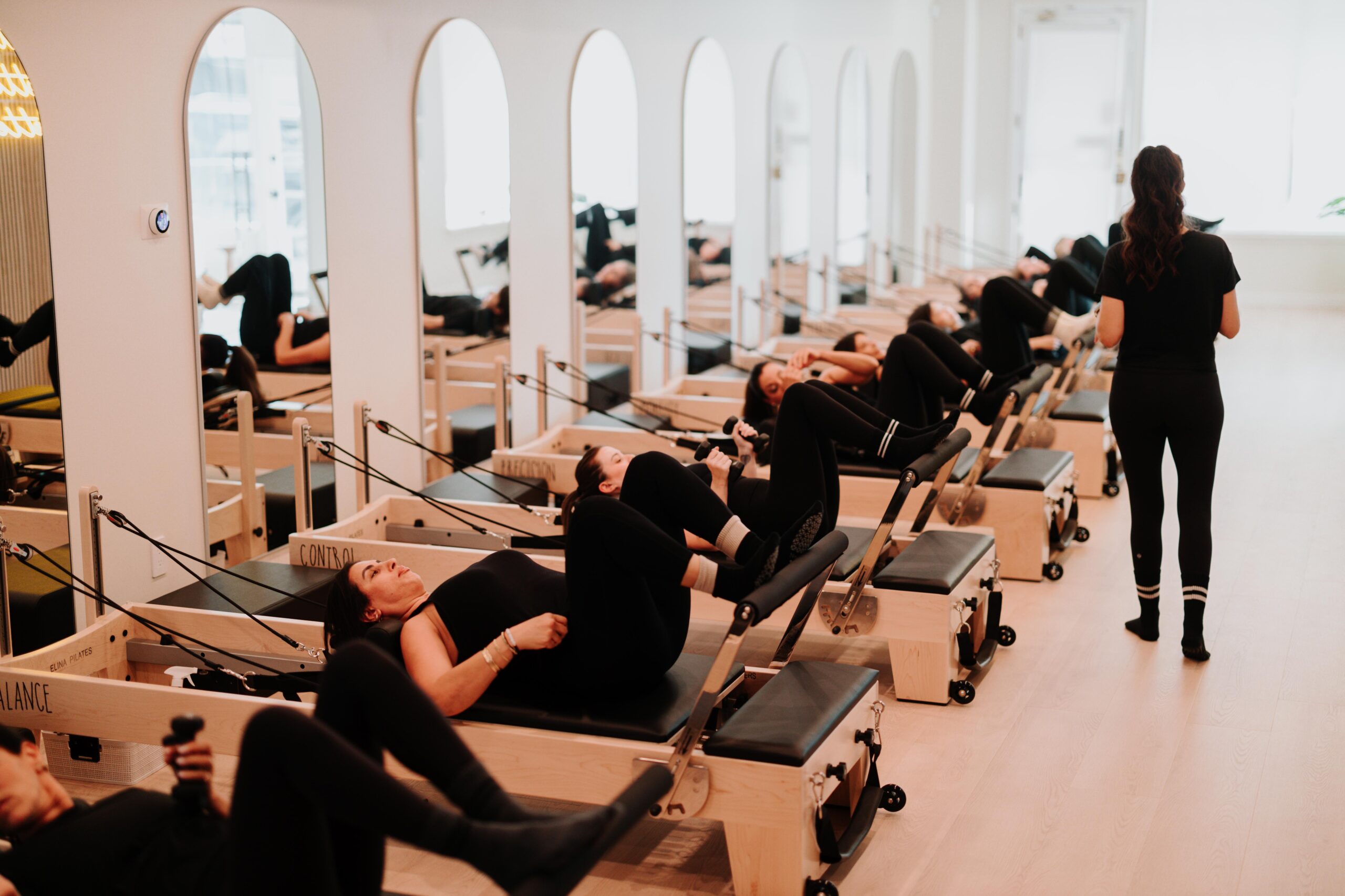 Boutique reformer Pilates class at YA FIT Pilates near Encino and Woodland Hills
