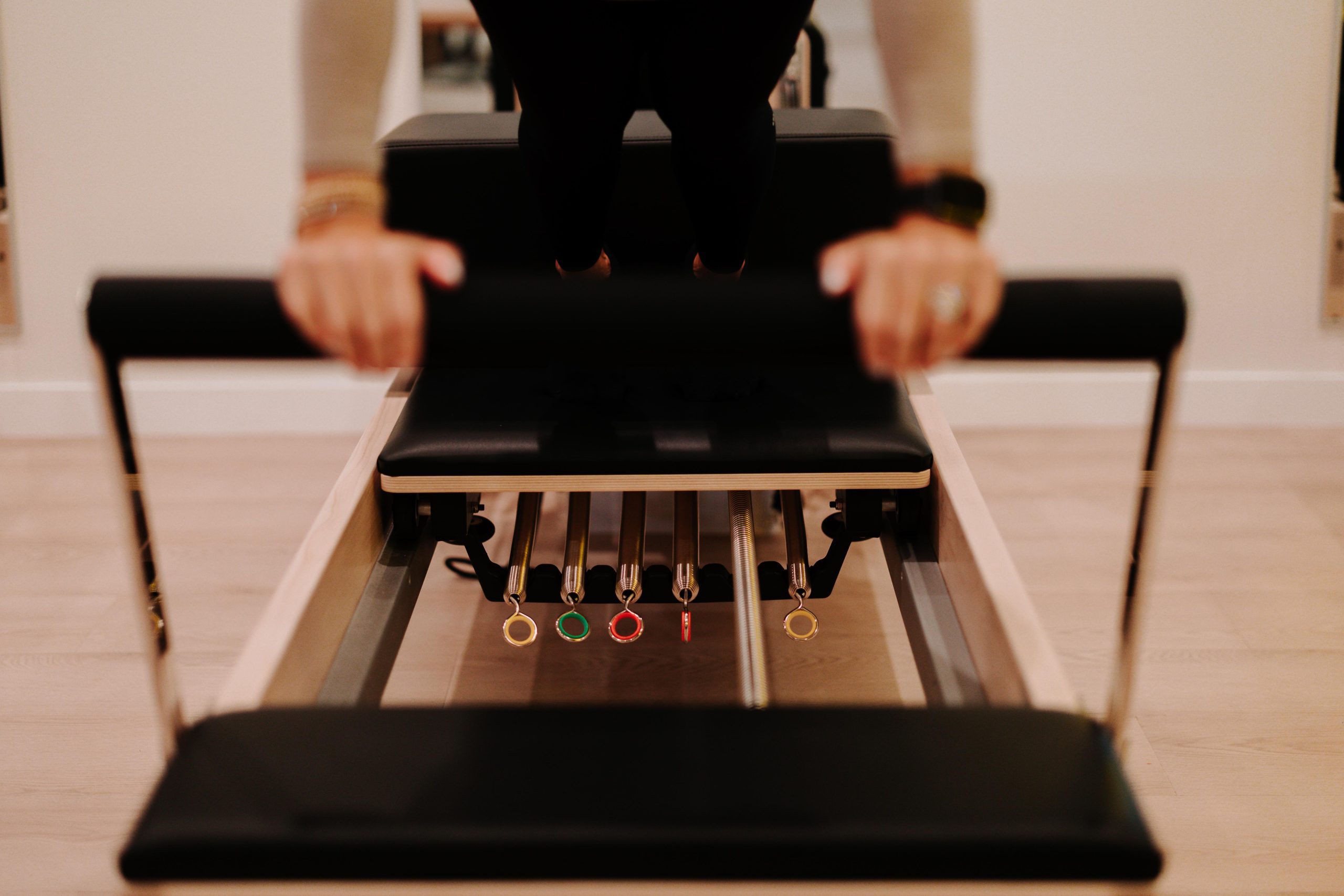 Small group reformer Pilates class at YA FIT Pilates Tarzana with 10 reformers per class